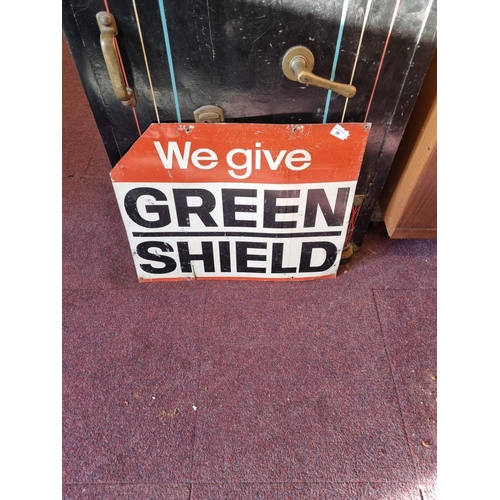 36 - One we give Greenshield stamp metal sign