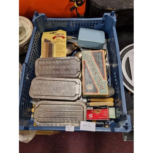 402 - One box containing various vintage razors with plated wear spoons etc