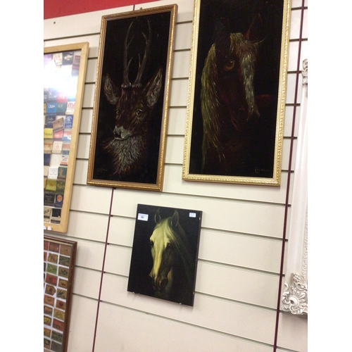 50 - Two Cashman framed velvet paintings with printed horse head scene