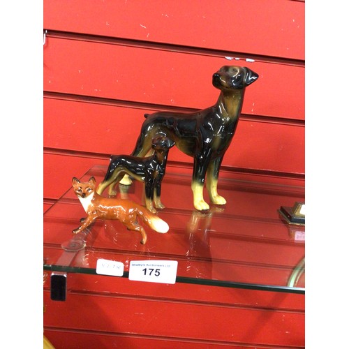 175 - One large pottery Doberman figurine with beswick Doberman and fox figurine