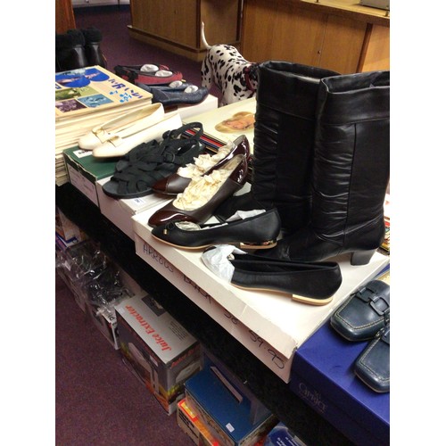 294 - One pair of ladies size 5 boots with size 5 ladies pumps with 3 pairs of shoes boots have been worn