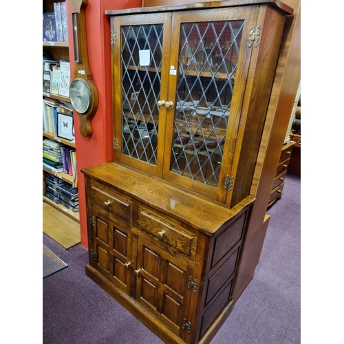 176 - 1x Oak display cabinet 2 door, 2 drawer