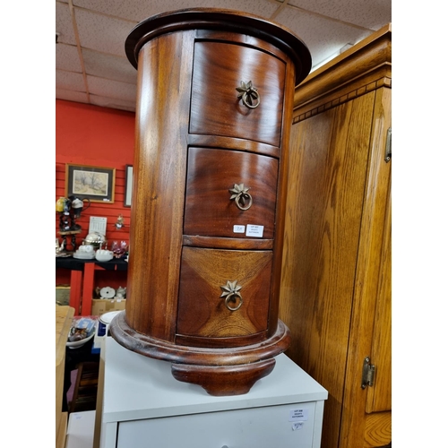 207 - 1x mahogany barrel side table three drawer