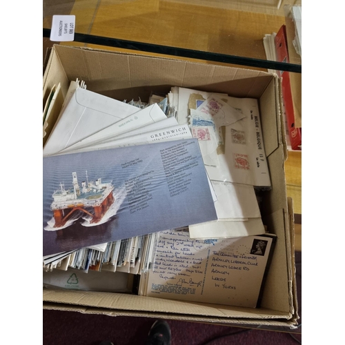 239 - A large collection of first day covers and stamps