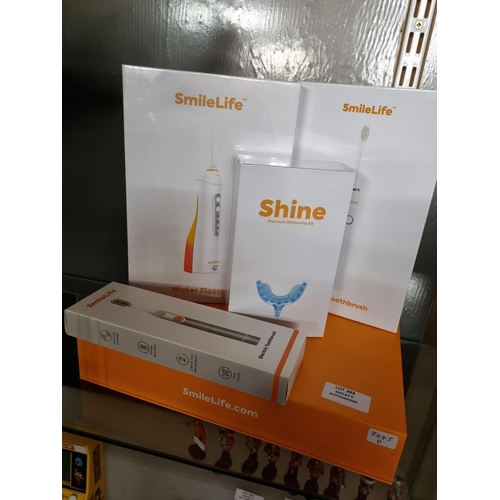 263 - 1x Smilelife teeth whitening set including 2x electric toothbrush, 1x whitening tooth guard and 1x w... 