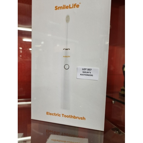 357 - 1x smilelife electric toothbrush (sealed in box)