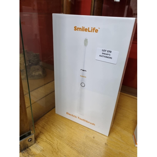 370 - 1x smilelife electric toothbrush (sealed in box)