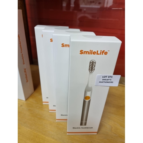 371 - 4x smilelife electric toothbrush (sealed in box)