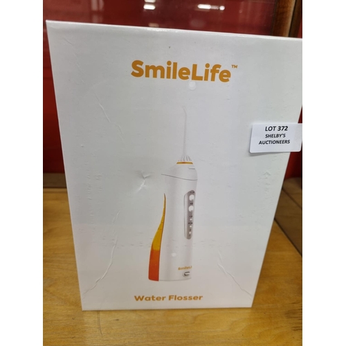 372 - 1x smilelife electric water flosser (sealed in box)