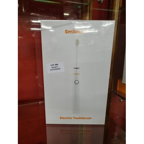 384 - 1x smilelife electric toothbrush (sealed in box)