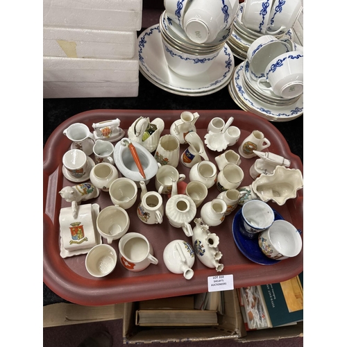 310 - 1x tray containing 32 pieces of various crestware pottery items, goss etc