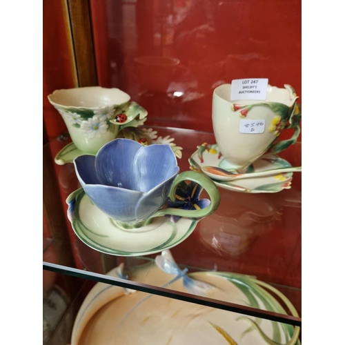 247 - 3x franz pottery cups and saucers