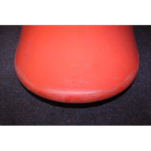 91 - 1 x Verner Panton red plastic moulded chair with Verner Panton on base.