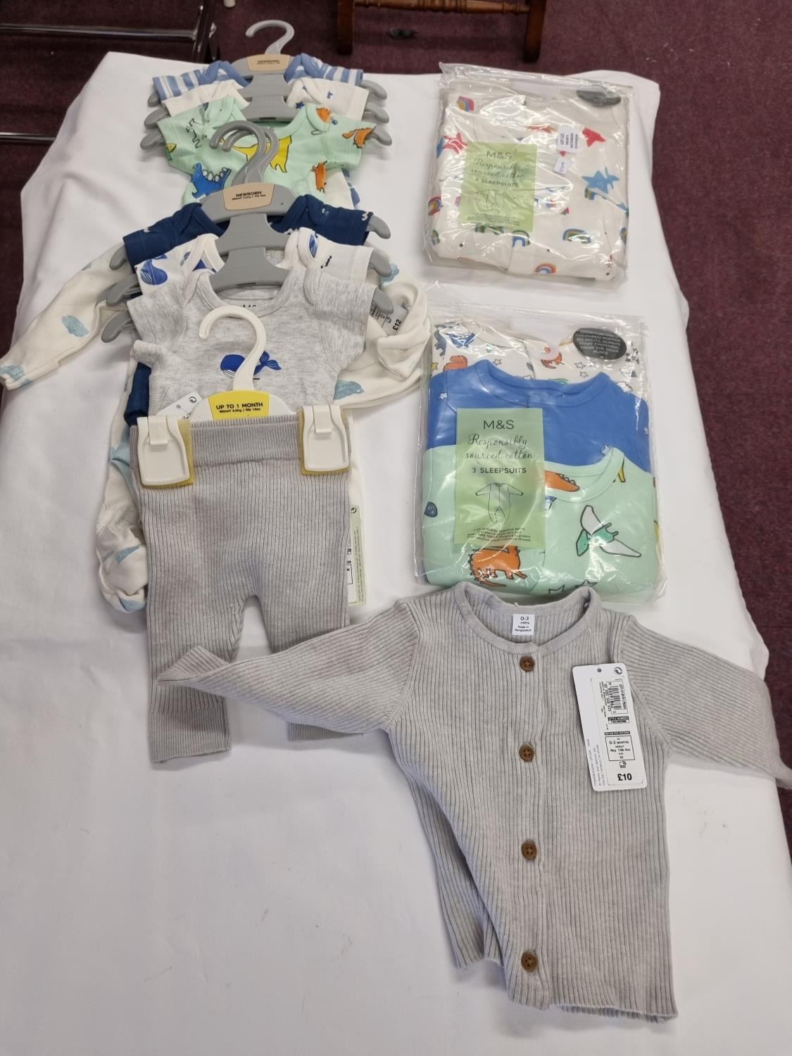 selection of marks and spencers new born baby clothing items boys
