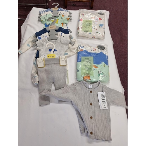 selection of marks and spencers new born baby clothing items boys