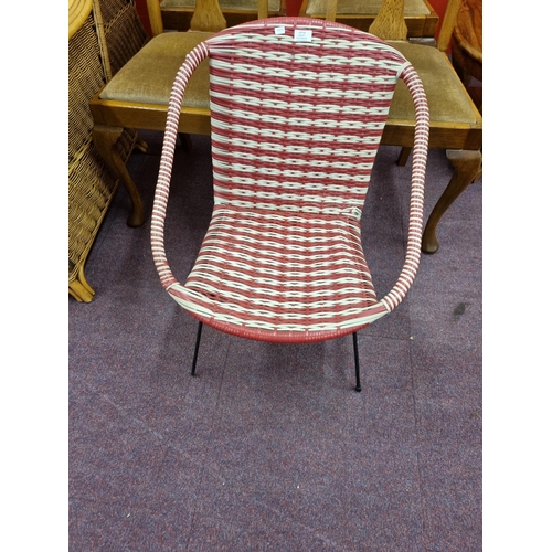 62 - 1960s plastic woven pin leg chair