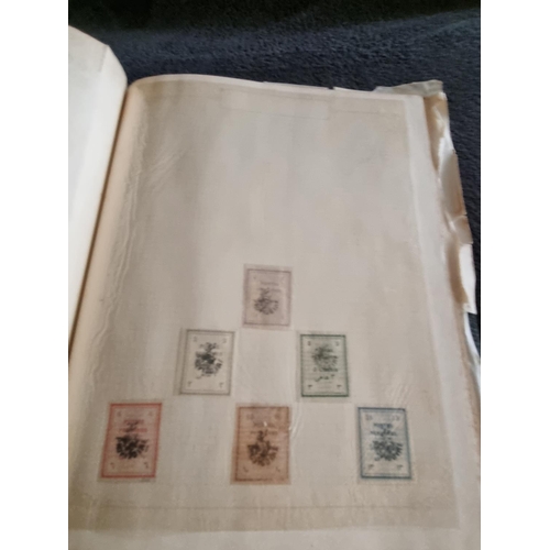 147 - 1 X STAMP ALBULM CONTAINING PERSIA STAMPS 1894 TO 1929 AND LIBERIA STAMPS 1921 TO 1936