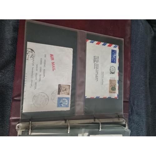 163 - ALBULM CONTAINING FIRST DAY COVERS AND FOREIGN USED STAMPS