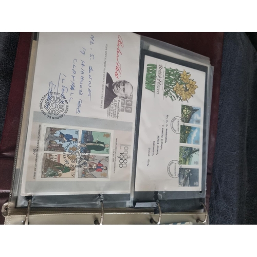 163 - ALBULM CONTAINING FIRST DAY COVERS AND FOREIGN USED STAMPS