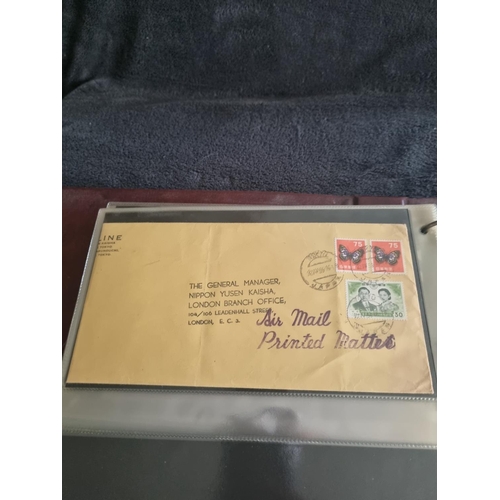 163 - ALBULM CONTAINING FIRST DAY COVERS AND FOREIGN USED STAMPS