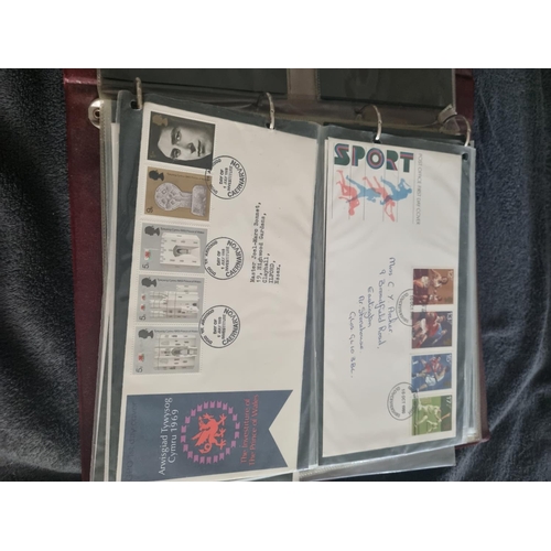 163 - ALBULM CONTAINING FIRST DAY COVERS AND FOREIGN USED STAMPS