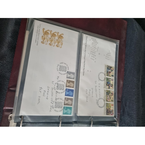 163 - ALBULM CONTAINING FIRST DAY COVERS AND FOREIGN USED STAMPS