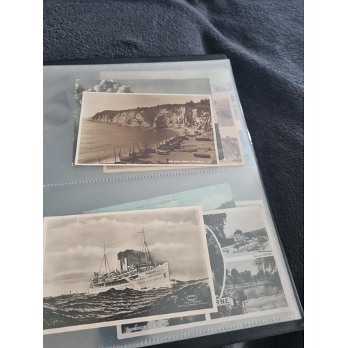 166 - 1 ALBULM CONTAINING POSTCARDS