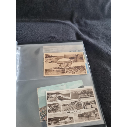 166 - 1 ALBULM CONTAINING POSTCARDS