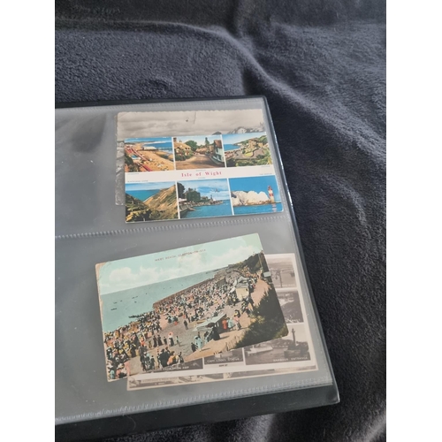 166 - 1 ALBULM CONTAINING POSTCARDS