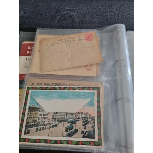 166 - 1 ALBULM CONTAINING POSTCARDS