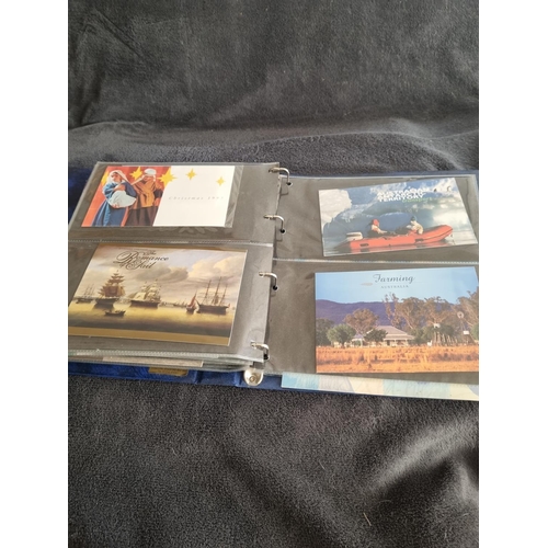 188 - ALBUM CONTAINING AUSTRALIA FIRST DAY COVERS AND STAMPS