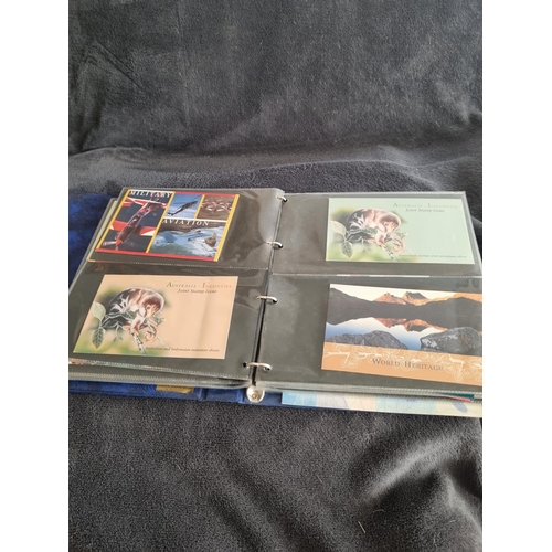 188 - ALBUM CONTAINING AUSTRALIA FIRST DAY COVERS AND STAMPS