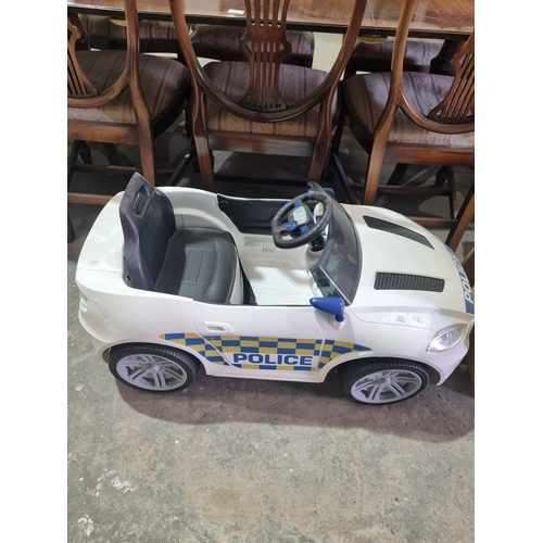 11 - 1 x child battery powererd police car no charger