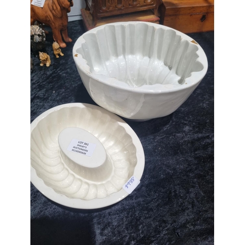 361 - 2 X LARGE POTTERY JELLY MOULDS