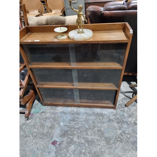 34 - 1 X OAK 3 TIER GLASS FRONTED BOOKCASE