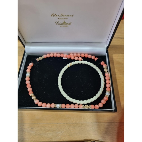 192 - 1 X 9CT GOLD AND CORAL NECKLACE WITH BANGLE