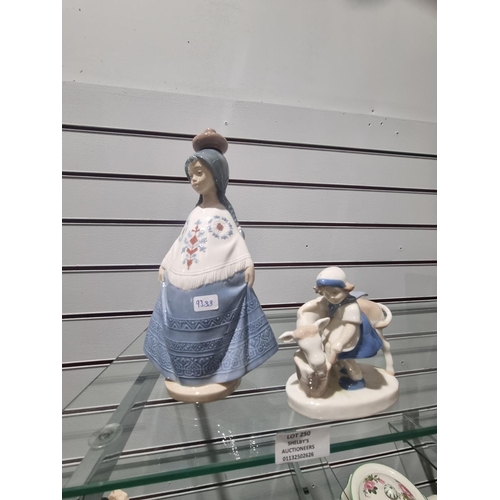 250 - 1 X NAO FIGURINE WITH GERMAN POTTERY FIGURINE