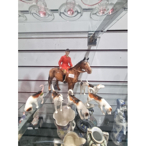 264 - 1 X BESWICK HORSE AND RIDER WITH BESWICK HOUND DOGS DOES NEED TO BE RESORED HAD LEG OFF