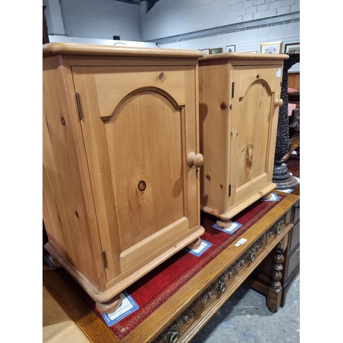 76 - PAIR OF PINE BEDSIDE CABINETS