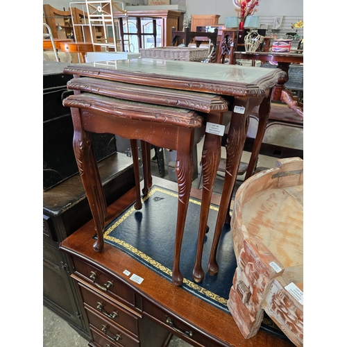 44 - 1 X NEST OF LEATHER TOPPED TABLES