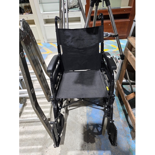 28 - 1X LOMAX FOLDING WHEEL CHAIR