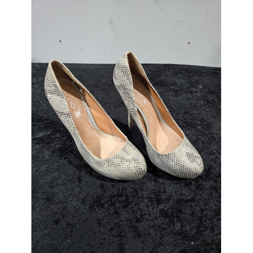 47 - pair of aldo snake skin print high heels size 39