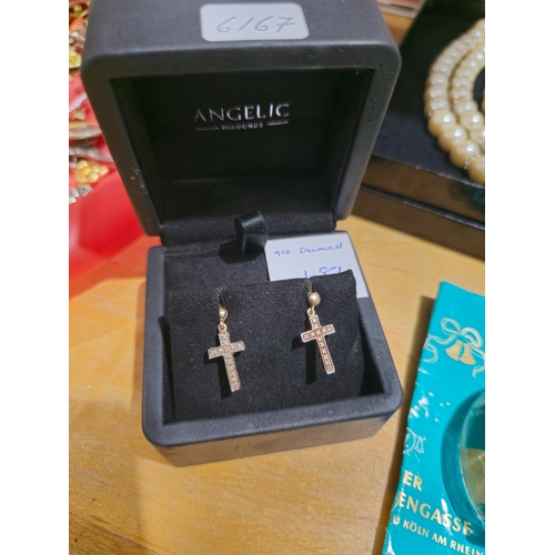 158 - pair of 9ct gold and diamond cross earrings 1.81 gram