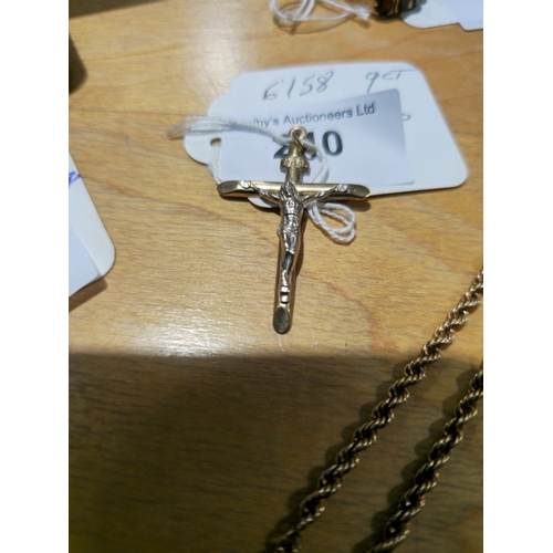 240 - 9ct gold cross pendant 1.30 gram