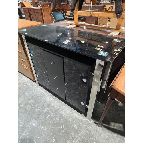 56 - black wood and glass 3 draw side board