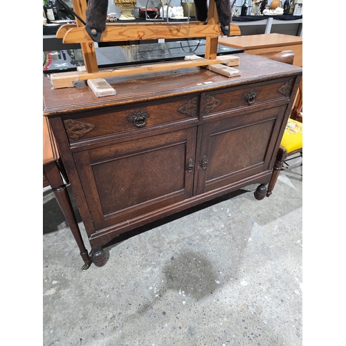 61 - 1940s oak 2 drawer sideboard