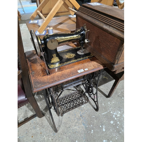 86 - singer treadle sewing machine with metal base