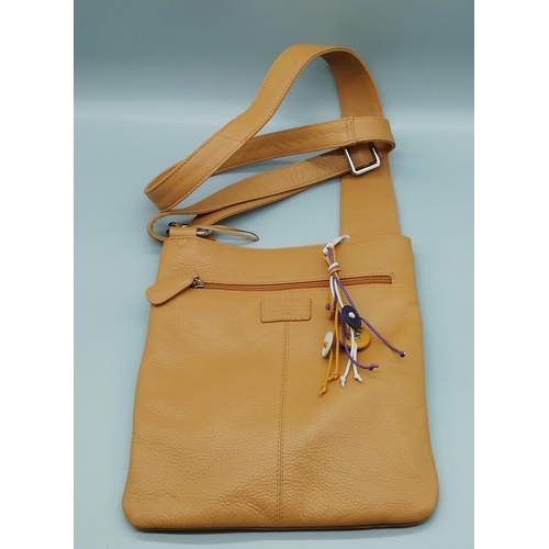 150 - Presented as a Radley Brown Leather Bag