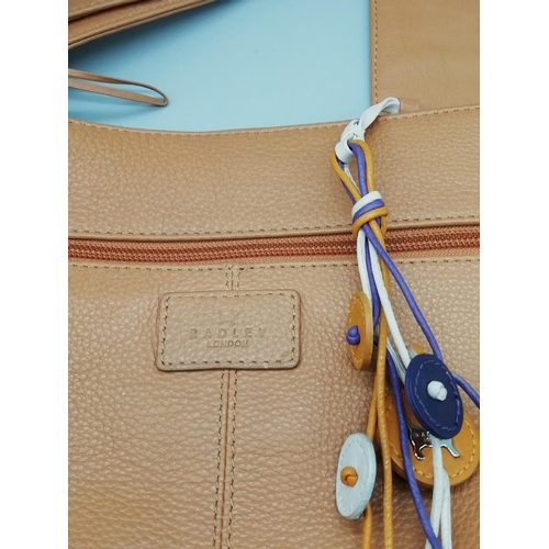 150 - Presented as a Radley Brown Leather Bag