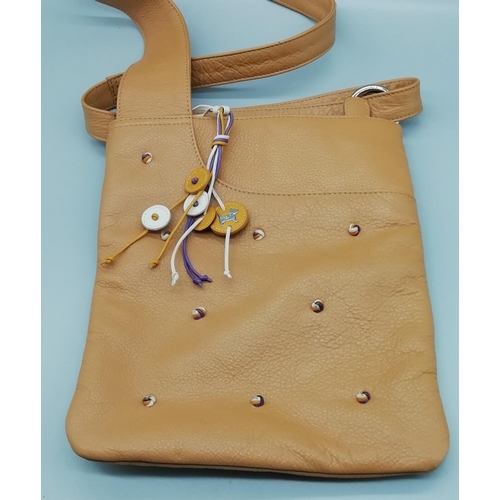 150 - Presented as a Radley Brown Leather Bag